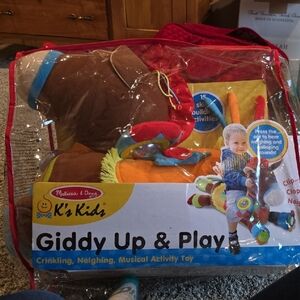 Melissa & Doug Giddy Up & Play Activity Toy - Brown and Red